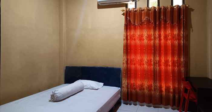 Kamar Tidur OYO 93073 Penginapan 69