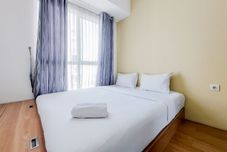 臥室 Restful and Strategic 1BR at Casa De Parco Apartment By Travelio