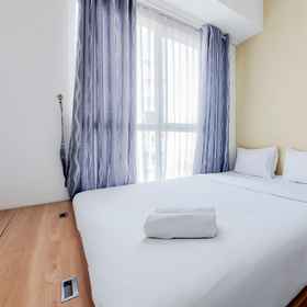 Bedroom 1 1BR ที่เงียบสงบและมีกลยุทธ์ที่ Casa De Parco Apartment By Travelio, โรงแรม & ที่พัก The Breeze BSD City