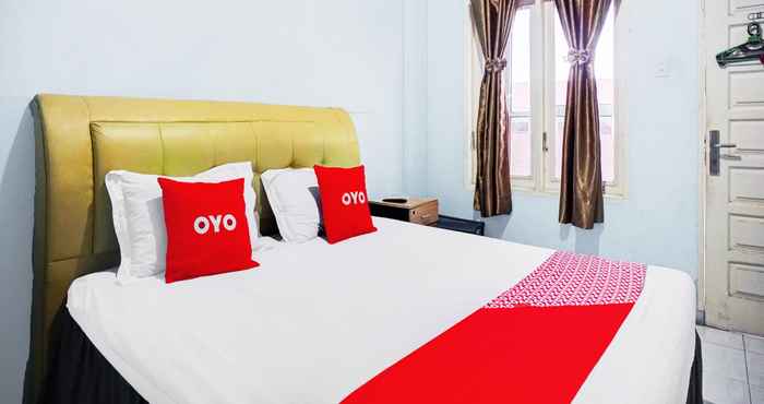 Bedroom OYO 93071 Home Stay Kembar Syariah 
