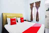 ห้องนอน OYO 93071 Home Stay Kembar Syariah 