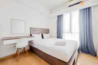 Bedroom Homey Living and Comfortable 2BR at Sky House BSD Apartment By Travelio