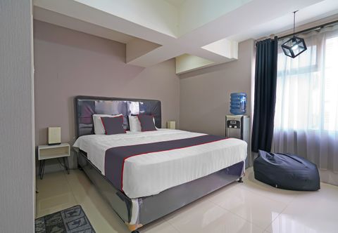 卧室 Capital O 92649 Jarrdin Apartment By Glory