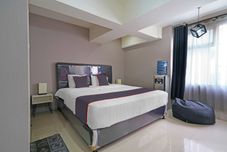 卧室 Capital O 92649 Jarrdin Apartment By Glory