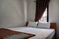 Bedroom OYO 93085 Homy Stay Syariah