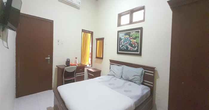 ห้องนอน OYO 93101 Al-ainah Family Homestay