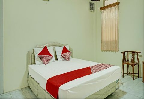 ห้องนอน OYO 93105 Wisma Sodikin