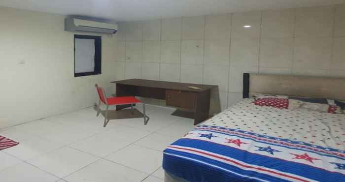 ห้องนอน OYO 93112 Garden Homestay 3 Merlion