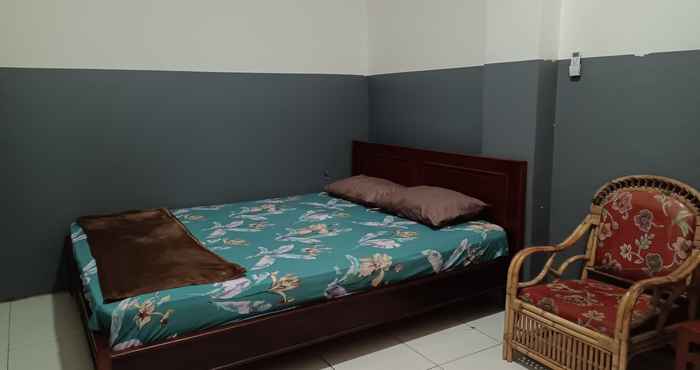 Kamar Tidur OYO 93117 Penginapan Tiga Dara