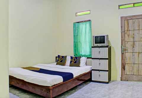 Bedroom SPOT ON 93089 Homestay Kamar Hijau Syariah