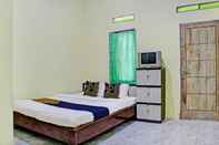 Bedroom SPOT ON 93089 Homestay Kamar Hijau Syariah