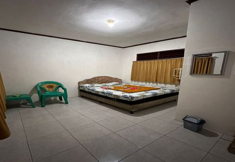 Kamar Tidur OYO 93128 Hotel Lamin 2