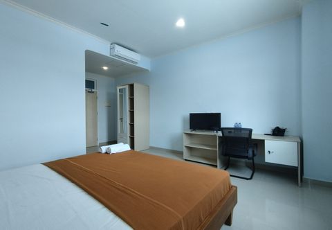 Bedroom Hotel Sutha Inn Syariah