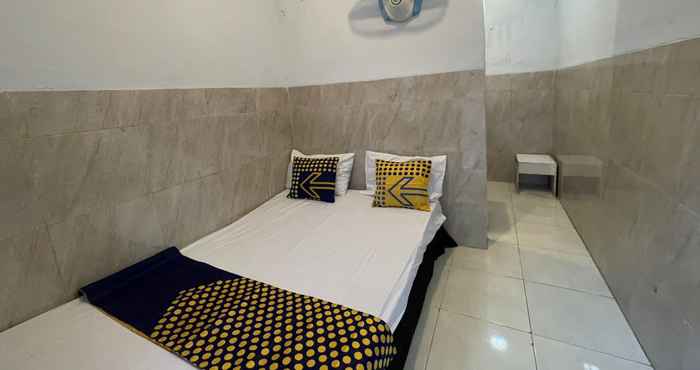 Bedroom SPOT ON 93149 Karman's Sari 1 Homestay Syariah