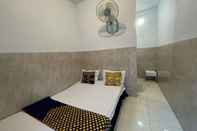 Bedroom SPOT ON 93149 Karman's Sari 1 Homestay Syariah