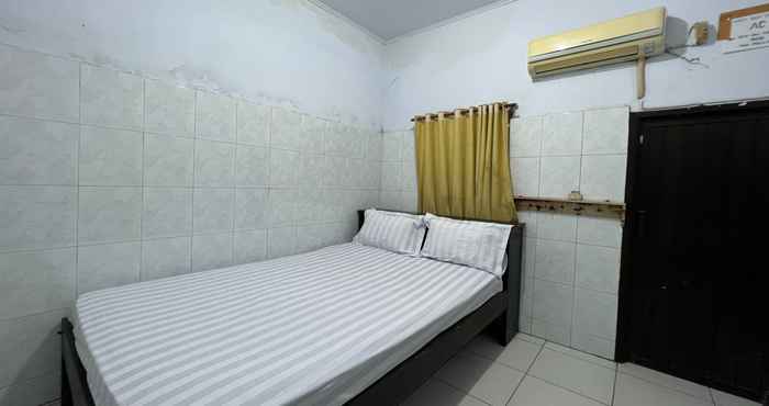 Kamar Tidur OYO 93137 Kost Maharaja 