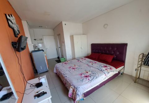 Phòng ngủ OYO Life 93139 Apartemen Grand Sentraland By Evi