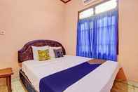 Bedroom SPOT ON 93199 Bunda Family Homestay Syariah