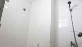 In-room Bathroom 4 Best Strategic Studio Apartment at Bassura City By Travelio