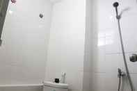 In-room Bathroom Best Strategic Studio Apartment at Bassura City By Travelio