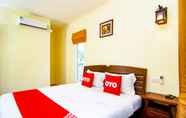 Kamar Tidur 4 OYO 607 Nawang Resort