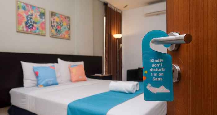 Kamar Tidur Sans Hotel Prime Cailendra Yogyakarta by RedDoorz