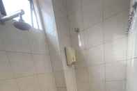 Phòng tắm bên trong Alia Express Green Mango, Kota Bharu