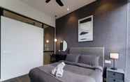 Bedroom 4 Scarletz Suites by Hapy Home