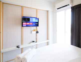 Kamar Tidur 2 Tidy and Simple Studio Apartment at Suncity Residence By Travelio