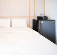 Kamar Tidur 2 Tidy and Simple Studio Apartment at Suncity Residence By Travelio