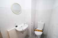 In-room Bathroom Tidy and Simple Studio Apartment at Suncity Residence By Travelio