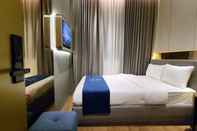 Bedroom Qube Hotel by 98hospitality