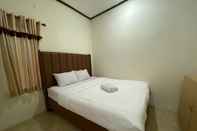 ห้องนอน Brilliant Homestay Dieng RedPartner