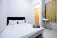 Bedroom Marcello Residence Siwalankerto near Petra University Surabaya Mitra RedDoorz