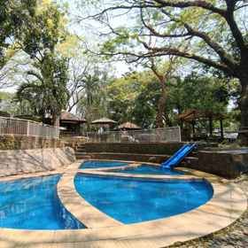 Swimming Pool 1 Grand Mulia Sakinah Boutique Resort Pandaan, Mitra Sehat Medika Hospital Hotels