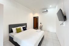 Phòng ngủ Urbanview Trunojoyo Homestay Banyuwangi by RedDoorz
