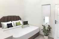 Bedroom Urbanview Hotel Syariah near Polda Jambi