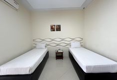 Phòng ngủ 2 Filia Syariah Homestay Palu RedPartner