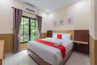 Kamar Tidur RedDoorz Plus @ La Asiana Guest house