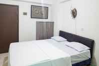 Bedroom RedLiving Apartemen LoftVilles City - Pelangi Rooms