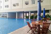 Swimming Pool RedLiving Apartemen LoftVilles City - Pelangi Rooms