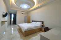 Kamar Tidur Maulidia Hotel & Convention Center