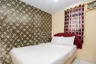 Bedroom RedLiving The Golf Apartement Modernland - Maria Room Tower Red