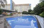 Swimming Pool 2 RedLiving The Golf Apartement Modernland - Maria Room Tower Red