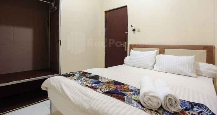 Kamar Tidur SRB Guest House Mitra RedDoorz