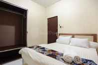 Bedroom SRB Guest House Mitra RedDoorz