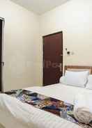 BEDROOM SRB Guest House Mitra RedDoorz