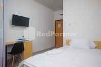 Kamar Tidur River House Mitra RedDoorz