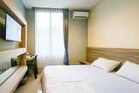 Bedroom Wi Kost Premiere Inn mitra RedDoorz