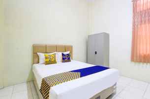 SPOT ON 93245 Guest House Mulia Syariah , Rp 387.660